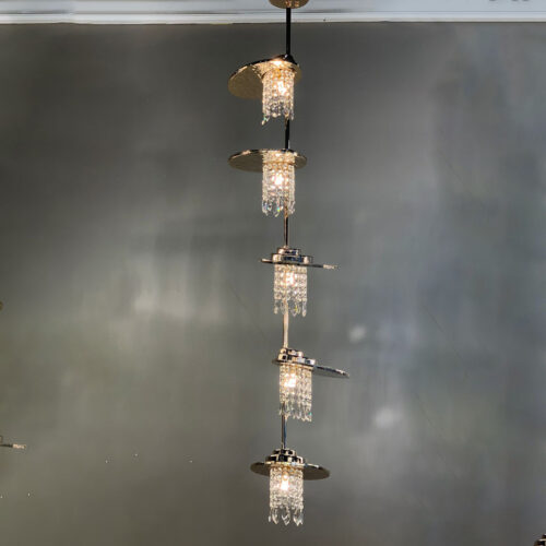 Elevate your staircase with a custom deco pendant light.