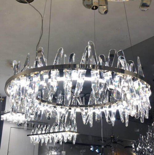 Enhance your space with a modern designer-decorated crystal chandelier.