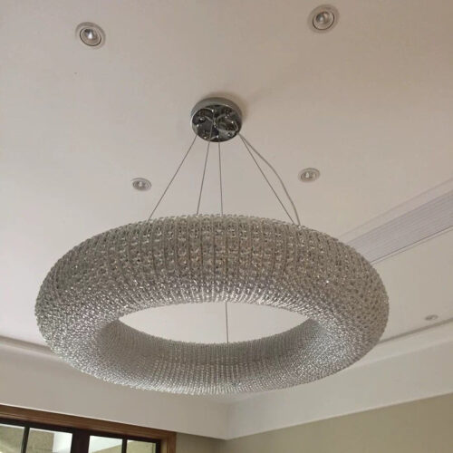 Introducing a new product for residential decoration: custom steel pendant light, ideal for hotel villa malls, featuring a modern crystal chandelier for luxurious ambiance.