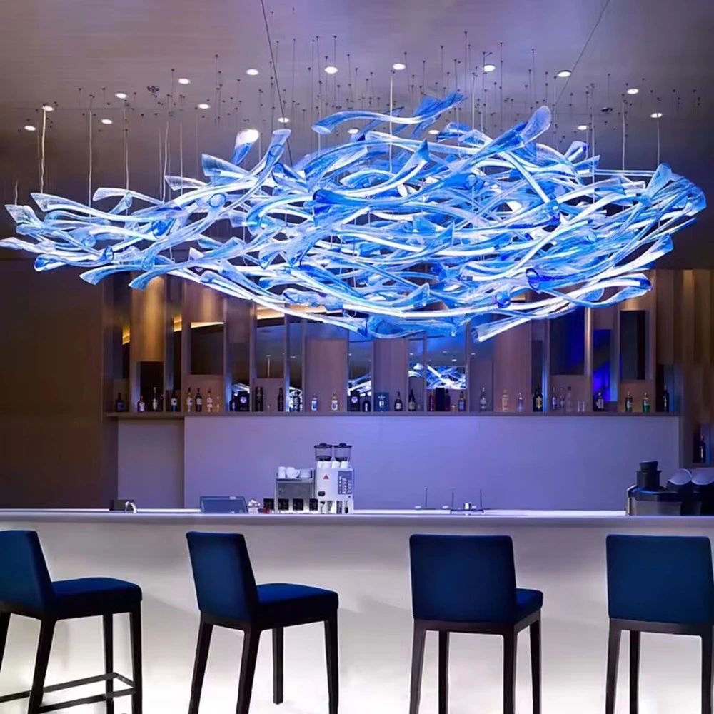 Enhance your hotel or restaurant with our handmade blown glass chandelier. Featuring an irregular empty pipe design, perfect for creating a unique and artistic atmosphere.