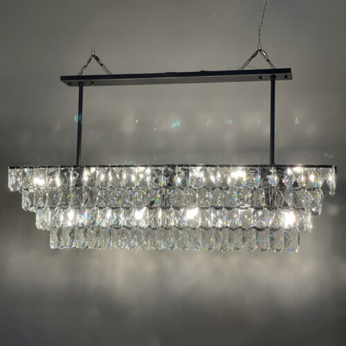 Enhance your kitchen with modern chandelier lighting for your counter area.