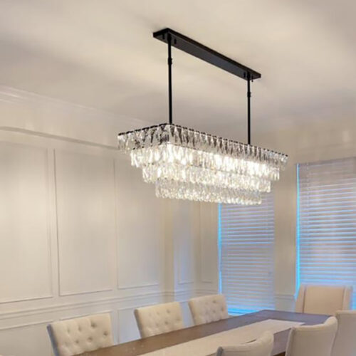 Enhance your kitchen with modern chandelier lighting for your counter area.